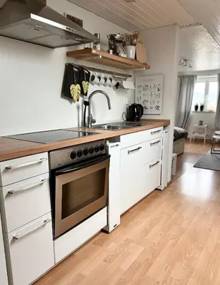 Küche/Küchenzeile in der Unterkunft Refugium by Zirwick Apartment