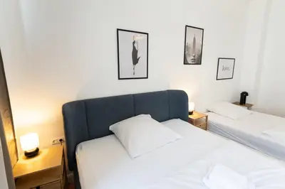 Ein Bett oder Betten in einem Zimmer der Unterkunft Hopfenhaus Kulmbach