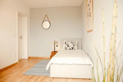 Ein Bett oder Betten in einem Zimmer der Unterkunft Juniorsuite-Apartment Weiden