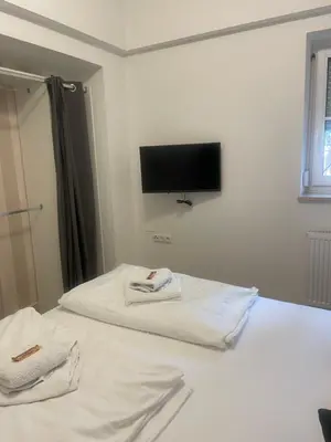 Ein Bett oder Betten in einem Zimmer der Unterkunft Suite 2