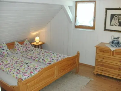 Ein Bett oder Betten in einem Zimmer der Unterkunft Gasthof Bischofsmühle