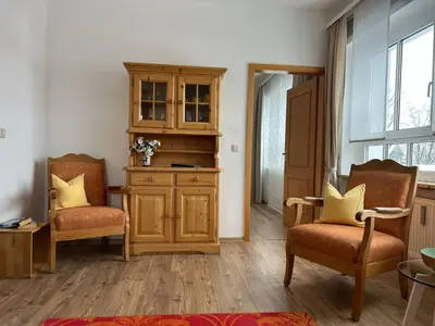 Ein Sitzbereich in der Unterkunft Vier Jahreszeiten Suite