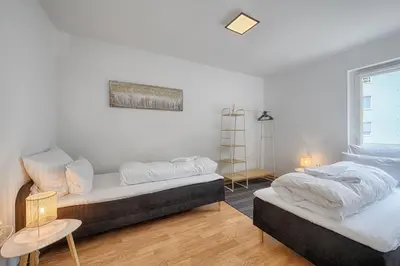 Ein Bett oder Betten in einem Zimmer der Unterkunft Select-Home 3 - Netflix - Parkplatz - Business Home