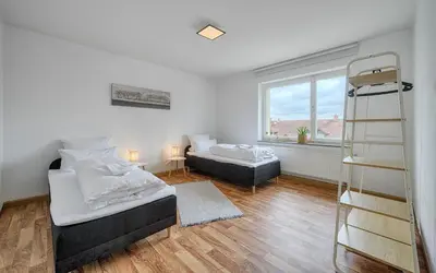 Ein Bett oder Betten in einem Zimmer der Unterkunft Select-Home 3 - Netflix - Parkplatz - Business Home