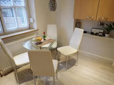 Ein Sitzbereich in der Unterkunft Ferienwohnung Nayla im Frankenwald