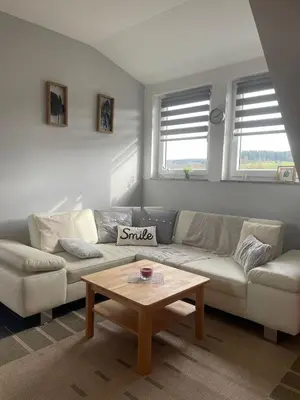 Ein Sitzbereich in der Unterkunft Ferienwohnung Knecht