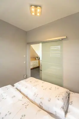 Ein Bett oder Betten in einem Zimmer der Unterkunft Ferienwohnung Knecht
