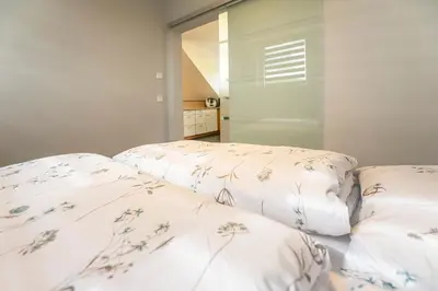 Ein Bett oder Betten in einem Zimmer der Unterkunft Ferienwohnung Knecht