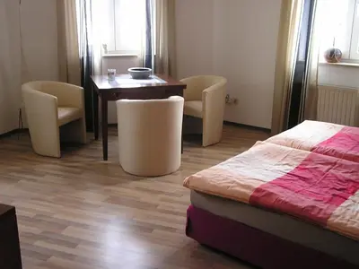 Ein Bett oder Betten in einem Zimmer der Unterkunft Auerbachs Keller