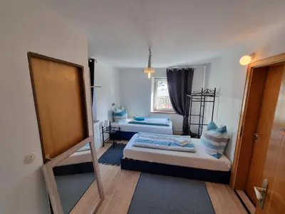 Ein Bett oder Betten in einem Zimmer der Unterkunft Simon´s Serviceapartment