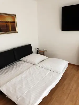 Ein Bett oder Betten in einem Zimmer der Unterkunft Ferienwohnung Nella