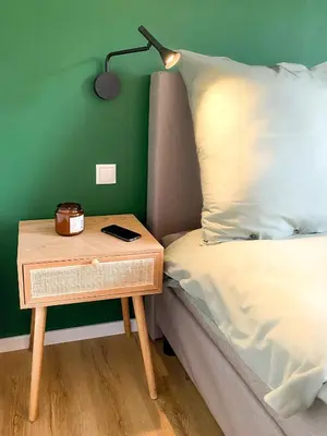 Ein Bett oder Betten in einem Zimmer der Unterkunft Kleines Glück zentral mit Balkon und Parkplatz