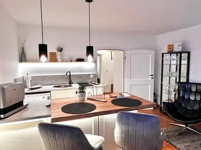 Ein Sitzbereich in der Unterkunft Apartment Elysium am Rosengarten