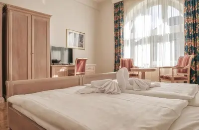 Ein Bett oder Betten in einem Zimmer der Unterkunft Augustenhof