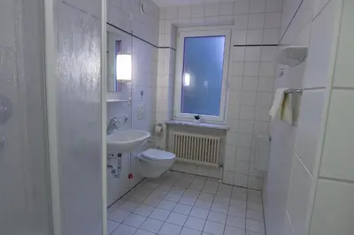 Ein Badezimmer in der Unterkunft Green Night Hotel