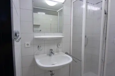 Ein Badezimmer in der Unterkunft Green Night Hotel