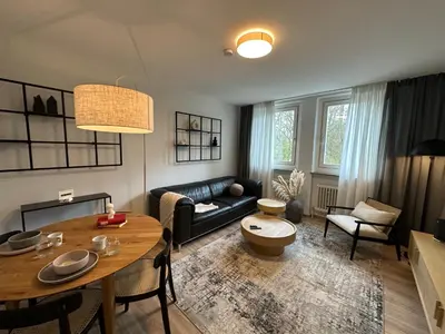 Ein Sitzbereich in der Unterkunft CityAppartLuxe am Hofgarten - zwischen Uni und Stadt-Zentrum