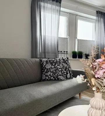 Ein Sitzbereich in der Unterkunft City Flair by Zirwick Apartment