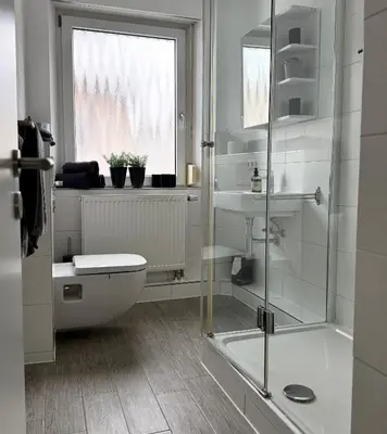 Ein Badezimmer in der Unterkunft City Flair by Zirwick Apartment