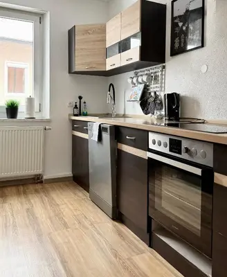 Küche/Küchenzeile in der Unterkunft City Flair by Zirwick Apartment