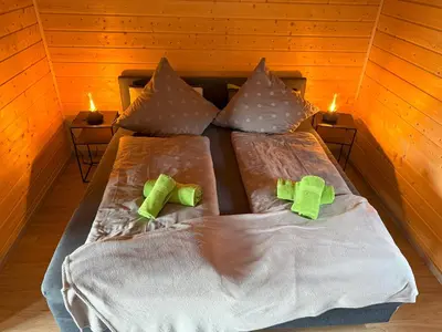 Ein Bett oder Betten in einem Zimmer der Unterkunft Ferienhaus Vogelnest