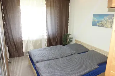 Ein Bett oder Betten in einem Zimmer der Unterkunft Ferienwohnung Oberwiesenthal