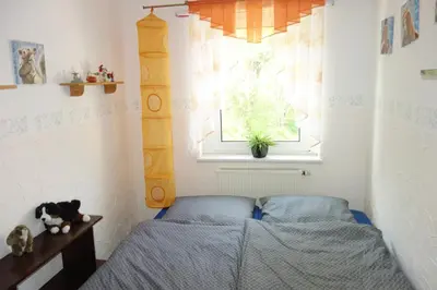 Ein Bett oder Betten in einem Zimmer der Unterkunft Ferienwohnung Oberwiesenthal