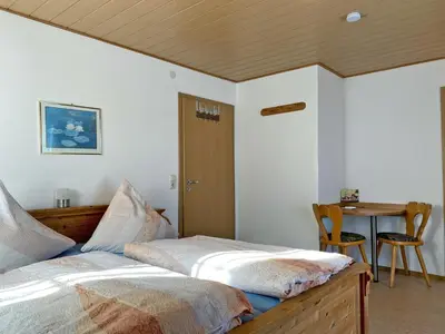 Ein Bett oder Betten in einem Zimmer der Unterkunft Kastanienhof