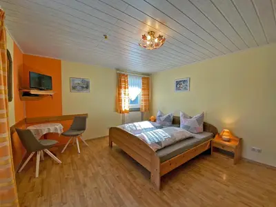 Ein Bett oder Betten in einem Zimmer der Unterkunft Kastanienhof