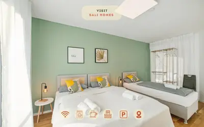 Ein Bett oder Betten in einem Zimmer der Unterkunft Salí Homes R4 - High-Quality Apartment with Terrace