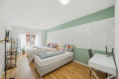 Ein Bett oder Betten in einem Zimmer der Unterkunft Salí Homes R4 - High-Quality Apartment with Terrace