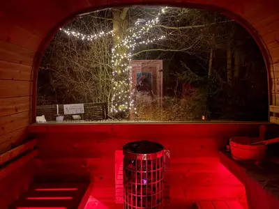Ein Garten an der Unterkunft Frankenwald Ferienhaus FourStars am See in Lichtenberg, Bayern, Oberfranken, Bad Steben - Hof -Saale, Rennsteig
