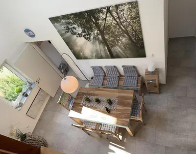 Ein Sitzbereich in der Unterkunft Frankenwald Ferienhaus FourStars am See in Lichtenberg, Bayern, Oberfranken, Bad Steben - Hof -Saale, Rennsteig