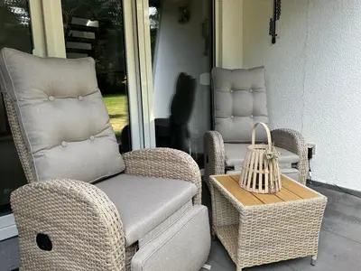 Ein Sitzbereich in der Unterkunft Frankenwald Ferienhaus FourStars am See in Lichtenberg, Bayern, Oberfranken, Bad Steben - Hof -Saale, Rennsteig
