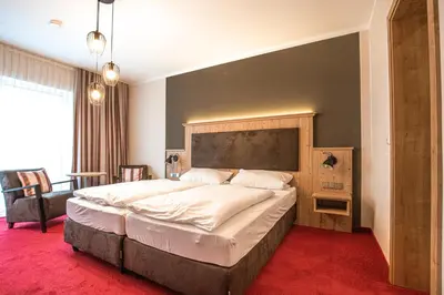 Ein Bett oder Betten in einem Zimmer der Unterkunft Landgasthof Thiem