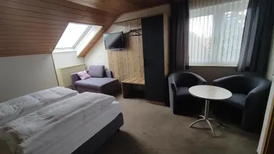 Ein Bett oder Betten in einem Zimmer der Unterkunft Landgasthof Thiem