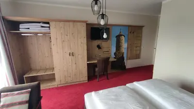 Ein Bett oder Betten in einem Zimmer der Unterkunft Landgasthof Thiem