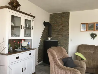 Ein Sitzbereich in der Unterkunft Ferienwohnung Auenthal