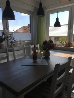 Ein Sitzbereich in der Unterkunft Ferienwohnung Auenthal