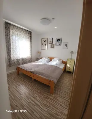 Ein Bett oder Betten in einem Zimmer der Unterkunft 80qm mit Balkon 3 getrennte Räume