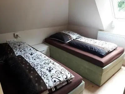 Ein Bett oder Betten in einem Zimmer der Unterkunft Ferienwohnung Bänsch