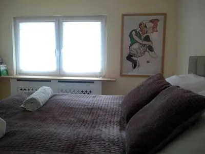 Ein Bett oder Betten in einem Zimmer der Unterkunft POLKA