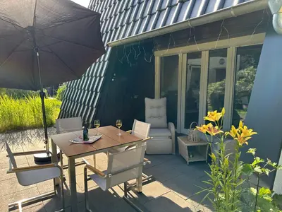 Ein Garten an der Unterkunft Komfortables Ferienhaus in Lichtenberg bei Hof im Frankenwald 400m vom See nahe Bad Steben