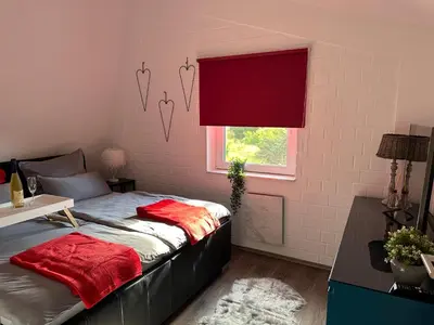 Ein Bett oder Betten in einem Zimmer der Unterkunft Komfortables Ferienhaus in Lichtenberg bei Hof im Frankenwald 400m vom See nahe Bad Steben