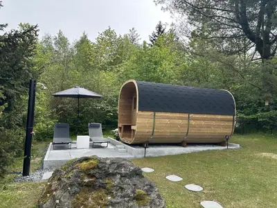 Ein Garten an der Unterkunft Komfortables Ferienhaus 80qm unweit vom See in Lichtenberg - Frankenwald - Bad Steben - Hof Saale