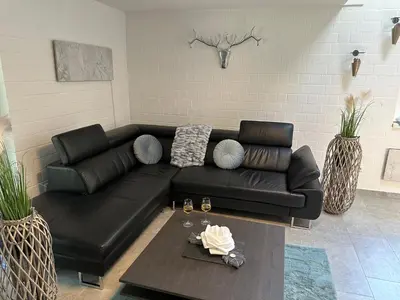 Ein Sitzbereich in der Unterkunft Komfortables Ferienhaus 80qm unweit vom See in Lichtenberg - Frankenwald - Bad Steben - Hof Saale