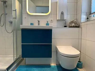 Ein Badezimmer in der Unterkunft Komfortables Ferienhaus 80qm unweit vom See in Lichtenberg - Frankenwald - Bad Steben - Hof Saale