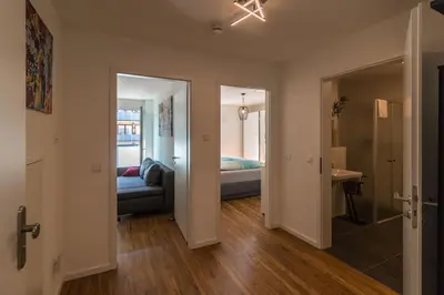 Ein Bett oder Betten in einem Zimmer der Unterkunft CityHome Christopher CHC