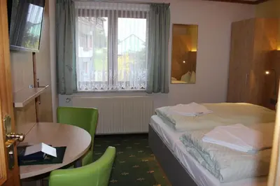 Ein Bett oder Betten in einem Zimmer der Unterkunft Landhotel Gasthof Zwota