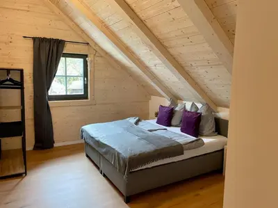 Ein Bett oder Betten in einem Zimmer der Unterkunft Das Landchalet